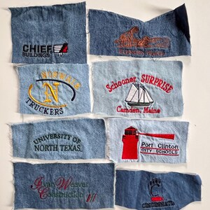 May include: Eight rectangular denim fabric patches with embroidered designs. Logos include Chief Buildings, Elkhorn Ranch, Norwalk Truckers, Schooner Surprise Camden Maine, University of North Texas, Port Clinton City Schools, Ivan Weaver Construction, and Cincinnati.