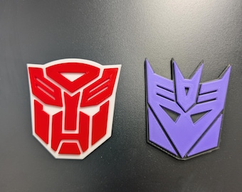 3D Printed Retro Robot Faction Magnets | Alien Robot Shield Fridge Magnet | 80s Cartoon Nostalgia Decor, Geeky Magnet, Sci-Fi Man Cave