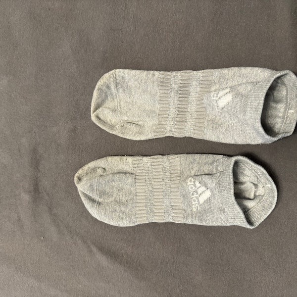 worn socks in grey