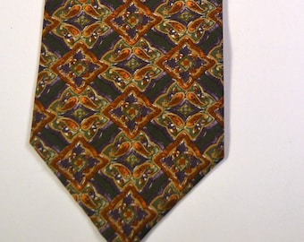 Gold Print Christian Dior  Necktie ....100% Silk....57 inches long....80's Fashion