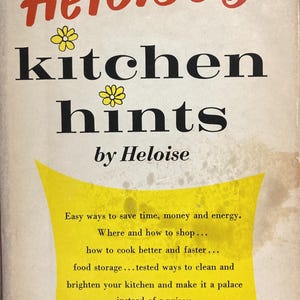 May include: A vintage book cover with a yellow and red design. The title is "Heloise's Kitchen Hints" by Heloise. The text describes easy ways to save time, money, and energy in the kitchen.