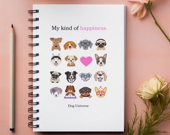 May include: A white spiral bound notebook with the text "My kind of happiness" and a grid of dog illustrations. The notebook has the text "Dog Universe" at the bottom. The notebook is on a pink surface with pink and white flowers.