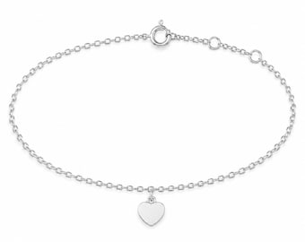May include: A silver-toned chain bracelet featuring a small, smooth heart-shaped charm suspended from the centre. The bracelet includes a circular spring ring clasp and two additional adjustment rings at the end of the chain for sizing.