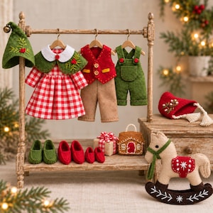 May include: A miniature wooden clothing rack displays felt doll outfits including a red and white gingham dress with a green cape, a red vest with tan trousers, and green overalls. Accessories include felt shoes, a gift box, a house, and a rocking horse.