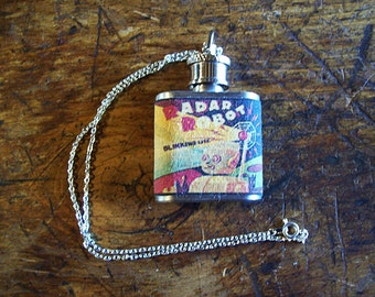 robot flask necklace retro vintage 1950s tin toy jewelry science fiction clip on flask kitsch