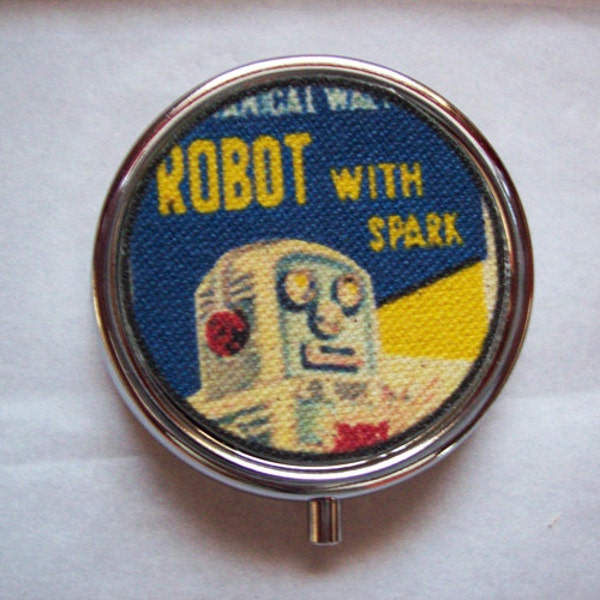 scatola pillola robot retrò vintage 1950 tin giocattolo kitsch vitamina caso