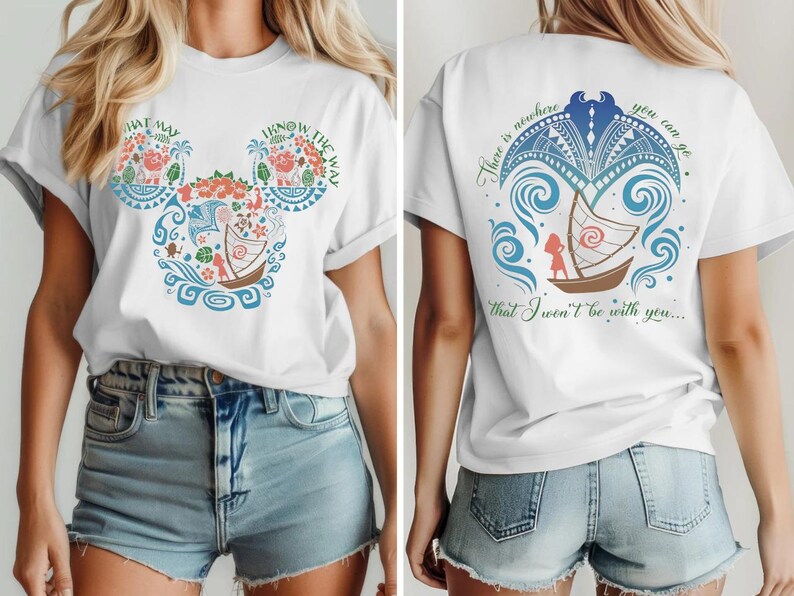 May include: White t-shirt featuring a colorful design with the text "THAT WAY I KNOW THE WAY" in a Mickey Mouse head shape. The back of the shirt has a boat design with the text "There is nowhere you can go that I won't be with you..."
