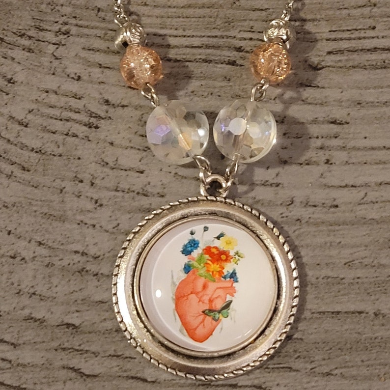 Anatomical Heart w Flowers cabochon necklace image 1