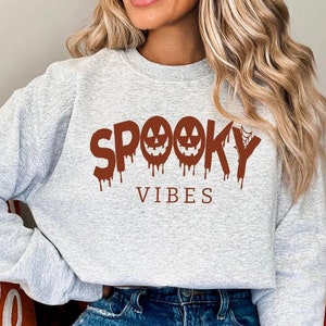 Retro Spooky Vibes Sweatshirt: Funny Ghost Graphic Halloween Pullover