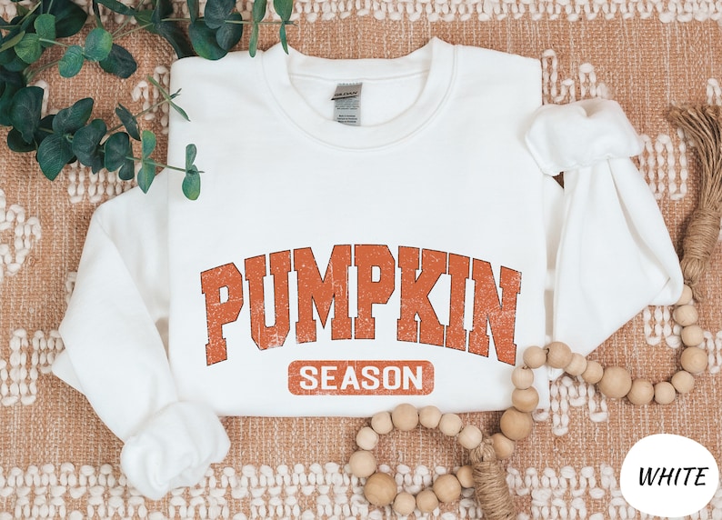 a white shirt with the words pumpkin season on it