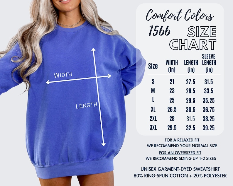 a woman wearing a blue sweatshirt with a size chart and measurements provided.