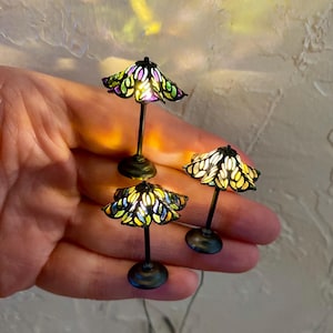 Miniature stained glass flower shade lamp, iron finish base, 1:12 scale working, battery powered lamps in 3 color combinations.