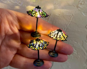 Miniature stained glass flower shade lamp, iron finish base, 1:12 scale working, battery powered lamps in 3 color combinations.