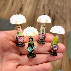 Miniature glass vase lamp with faux milk glass shade, 1:12 scale battery powered, dark bronze base, working lamp in 4 different colors.
