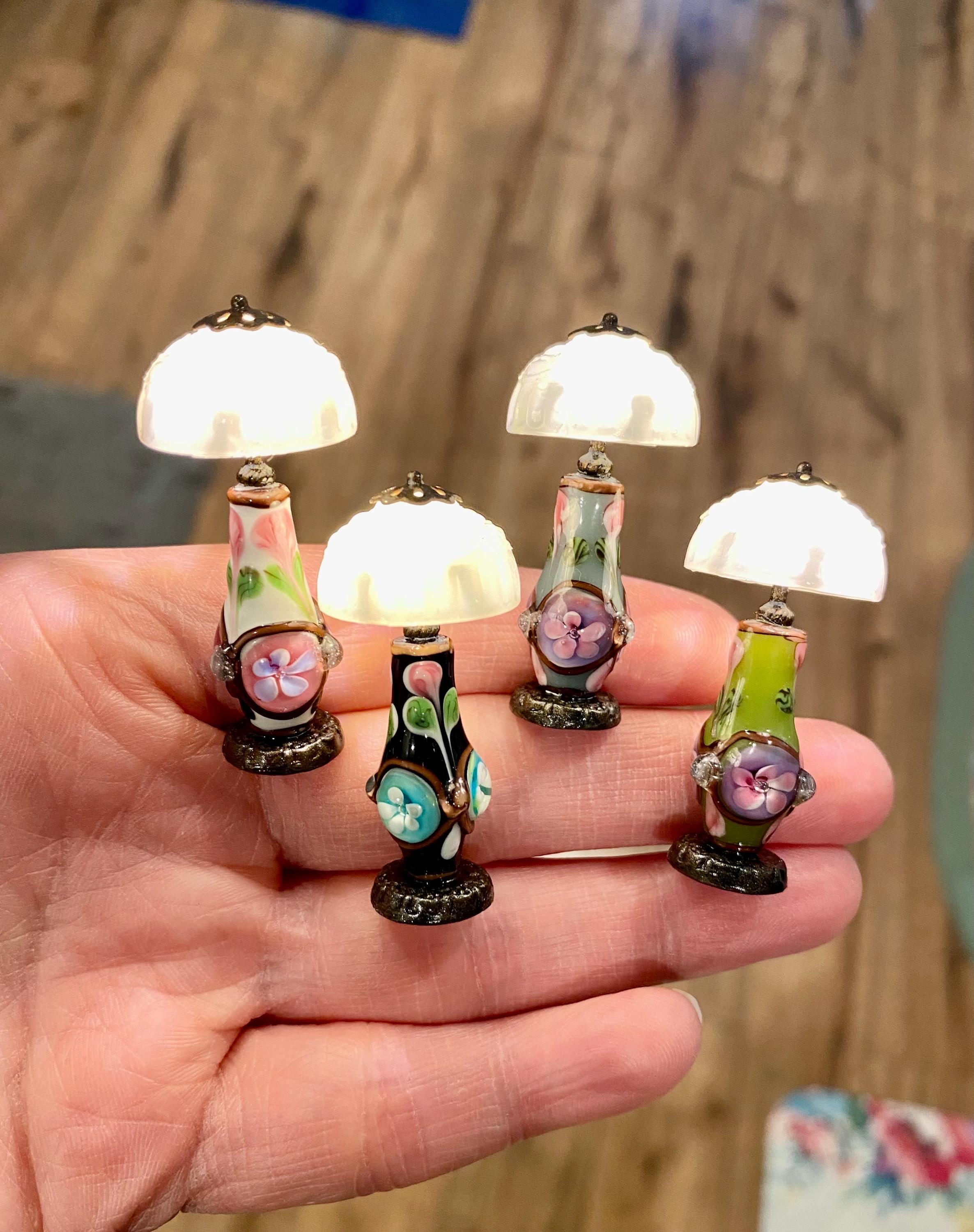 Miniature glass vase lamp with faux milk glass shade, 1:12 scale battery powered, dark bronze base, working lamp in 4 different colors.