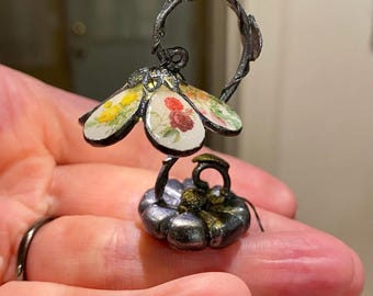 Miniature lamp with tiny rose images on the shade, vine and flower design, lovely pewter color, with working light.