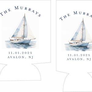 May include: White can cooler featuring a watercolor illustration of a sailboat on the water. The text "The Murrays" is arched above the boat, with the date "11.01.2025" and "Avalon, NJ" below.