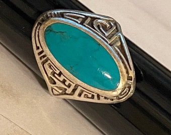 Vintage Sterling Silver and Turquoise Ring    Oval  Turquoise Stone set in Sterling Silver  Size 8.50   Sterling Silver and Turquoise Ring