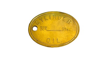 Vintage Cylinder Oil  Brass Barrel Check Tag    Two Inch Large Cylinder Oil Brass Barrel Check Tag