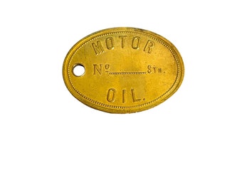Vintage Motor Oil  Brass Barrel Check Tag    Two Inch Large Motor Oil Brass Barrel Check Tag