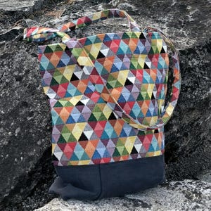 handmade shopping bag, in colored gobelin fabric, with black jeans base, shoulder bag, casual style
