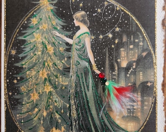 May include: A vintage Christmas card featuring a woman in an emerald green gown with gold accents, standing near a decorated Christmas tree. The background shows a city skyline and a starry night, all within a gold-lined circle.