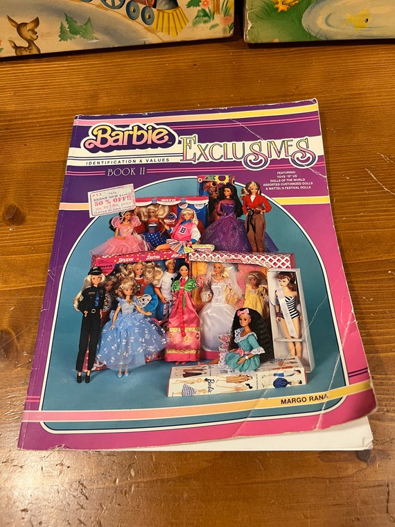 Barbie collector book hotsell