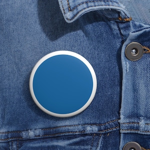 May include: A blue circle button with a white border.