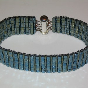 Triangulo tejido Reversible pulsera