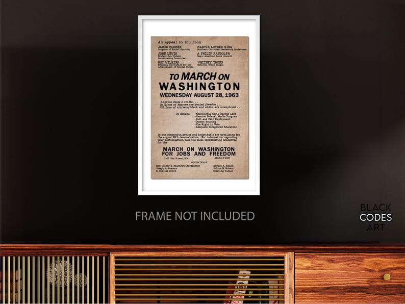 May include: A black and white poster with the text "To March on Washington, Wednesday August 28, 1963" and "March on Washington for Jobs and Freedom". The poster lists the names of several civil rights leaders, including Martin Luther King Jr., James Farmer, John Lewis, and A. Philip Randolph.