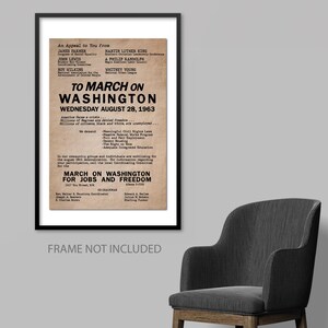 May include: A vintage poster with a tan background and black text. The poster is titled "To March on Washington" and lists the date as "Wednesday August 28, 1963". The poster also includes a list of names of people who are appealing to the public to join the march. The poster is framed in black.