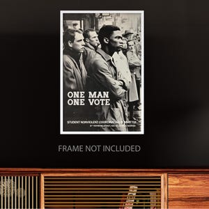 May include: Black and white poster with the text "ONE MAN ONE VOTE" and an image of a group of people. The poster is a vintage design, likely from the Student Nonviolent Coordinating Committee.
