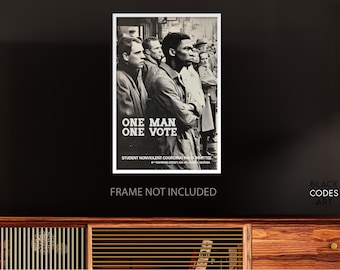 May include: Black and white poster with the text "ONE MAN ONE VOTE" and an image of a group of people. The poster is a vintage design, likely from the Student Nonviolent Coordinating Committee.