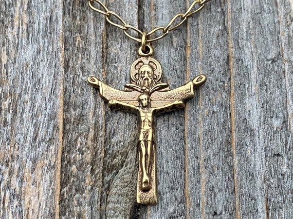 Cross pendant in wood from Assisi with outline body of Christ