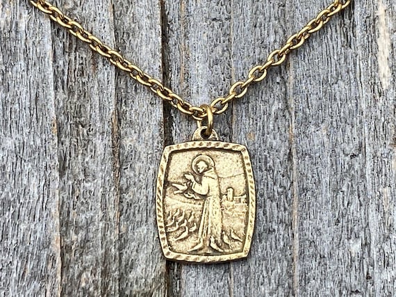 St francis shop gold pendant