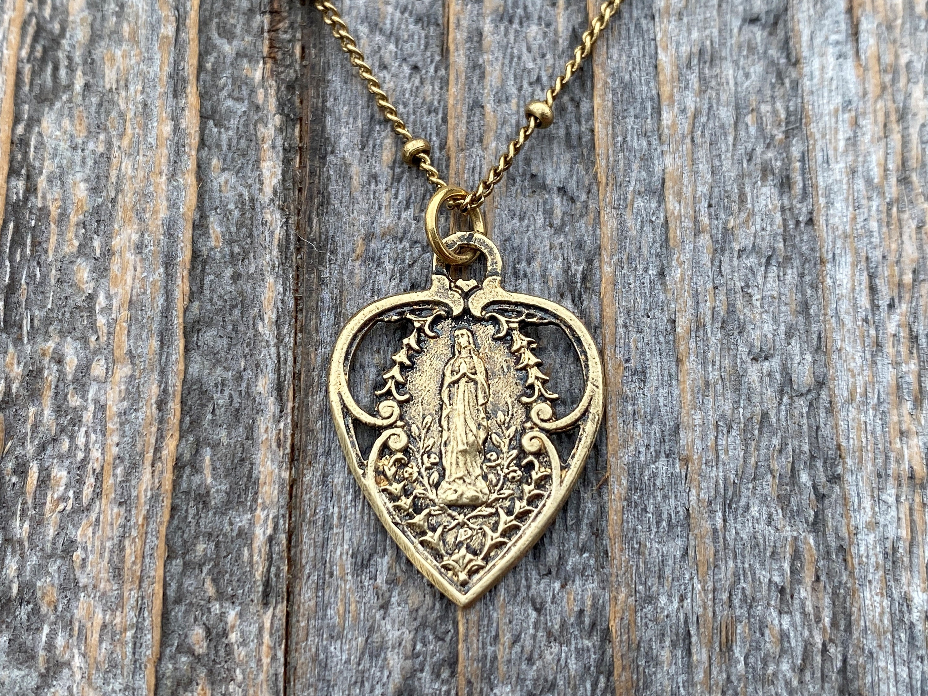 Virgin mary shop heart necklace