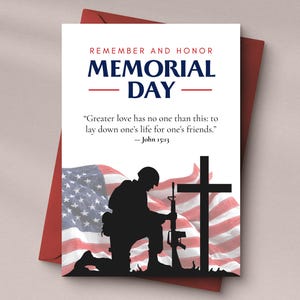 May include: A Memorial Day card with a red envelope. The card features the text "REMEMBER AND HONOR MEMORIAL DAY" and a quote from John 15:13. A silhouette of a soldier kneeling before a cross and the American flag is in the background.
