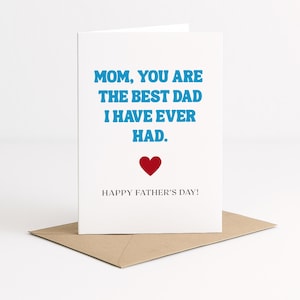 May include: A white greeting card with blue text that reads "MOM, YOU ARE THE BEST DAD I HAVE EVER HAD." A red heart is below the text, and "HAPPY FATHER'S DAY!" is written at the bottom. The card rests on a brown envelope.