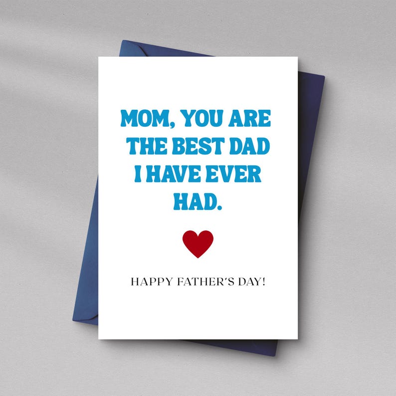 May include: A white greeting card with blue text that reads "MOM, YOU ARE THE BEST DAD I HAVE EVER HAD." A red heart is below the text, and "HAPPY FATHER'S DAY!" is written at the bottom. The card is inside a dark blue envelope.
