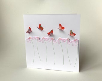 Origami paper butterflies and daisies greetings card