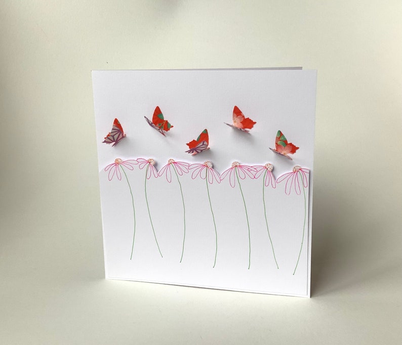 Origami paper butterflies and daisies greetings card image 1