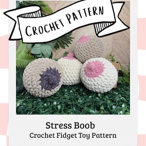 May include: A crochet pattern image featuring four handmade stress relief toys shaped like breasts. The toys are various colors, including beige, white, and pink, and are displayed on a bed of green foliage. The text "CROCHET PATTERN" is displayed on a banner.