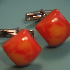 Pair of cufflinks with genuine tested vintage 1950s opaque flamy swirled red yellow bakelite plastic square beads + silvercolor metal parts