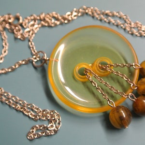 Unique one-of-a-kind pendant chain necklace with flamy greenyellow beads and yellow button of genuine tested vintage 1940s bakelite plastic