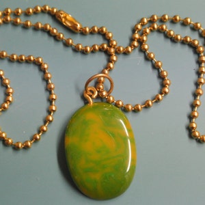 Pendant necklace with genuine tested vintage 1950s swirled yellow/ green bakelite plastic bead and brass ball chain