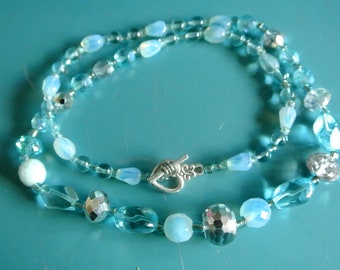 RARE UNIQUE one-of-a-kind handmade glass necklace with light blue/ clear grinded chrystal old beads and silvercolor heart toggle clasp