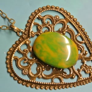 Pendant necklace with genuine tested vintage 1950s flamy yellow/ grass green tested bakelite plastic cabochon and antiquecolor bronze heart image 1