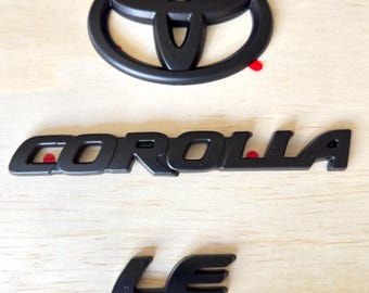 2020-2026 Toyota Corolla LE Sedan  Black Emblem Overlay Set | Genuine OEM | PT948-02200-02