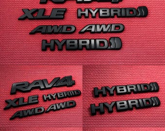 Zestaw nakładek na emblematy Toyota RAV4 Hybrid XLE 2019-2023 w kolorze matowej czerni PT948-4219B-02