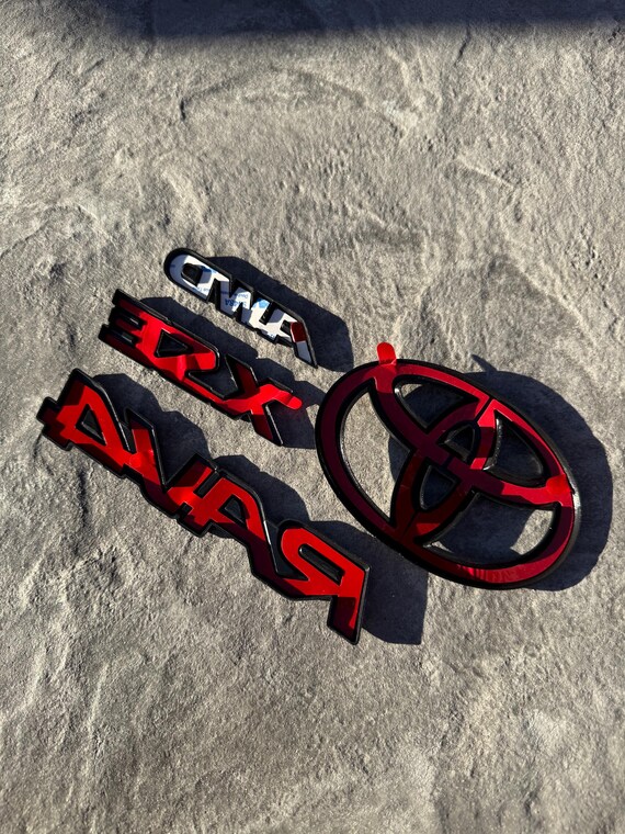 OVERLAY 2019 - 2025 TOYOTA RAV4 XSE HYBRD MATTE BLACK OUT EMBLEM KTS